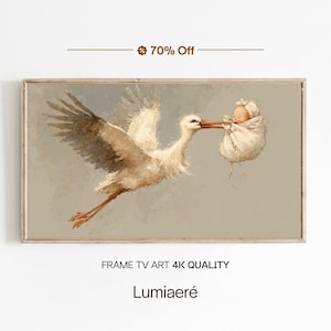 以下が含まれることがあります： 額装されたアートワークは、白い毛布に包まれた赤ちゃんを運ぶ、飛行中のコウノトリを描いています。 このアートワークは、ソフトな色と「FRAME TV ART 4K QUALITY」と「Lumiaeré」のテキストを備えたヴィンテージ美学を持っています。