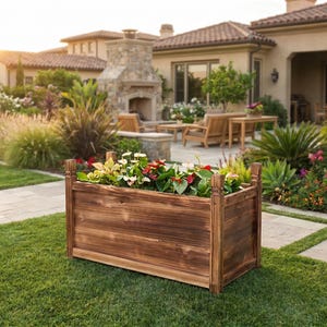 Raised pine planter box on grass lawn in sunlight