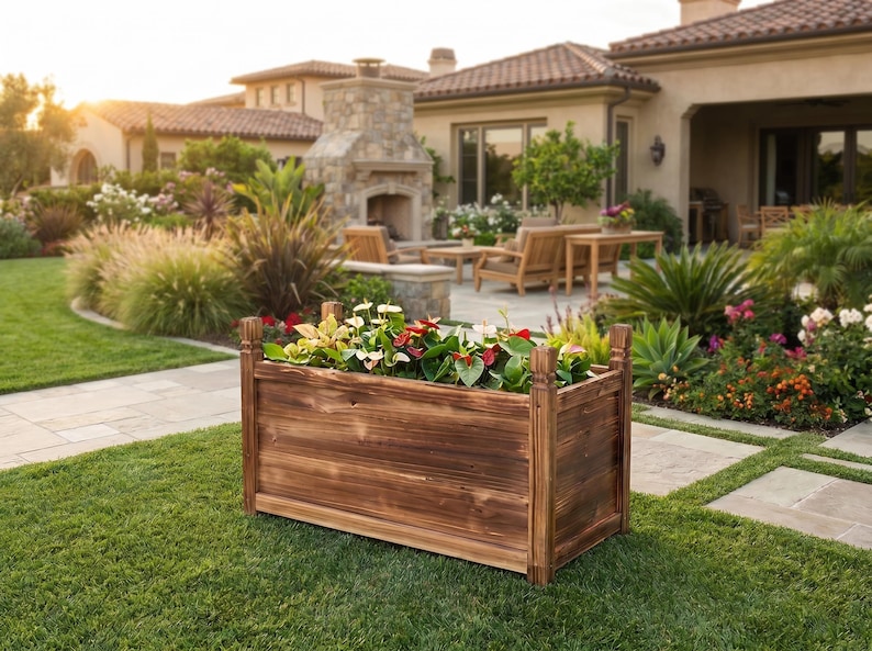 Raised pine planter box on grass lawn in sunlight