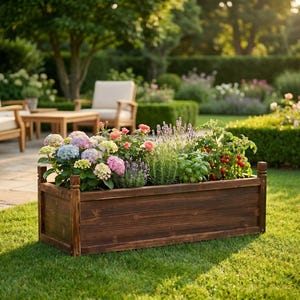 Dark brown pine planter bed used for herb gardening