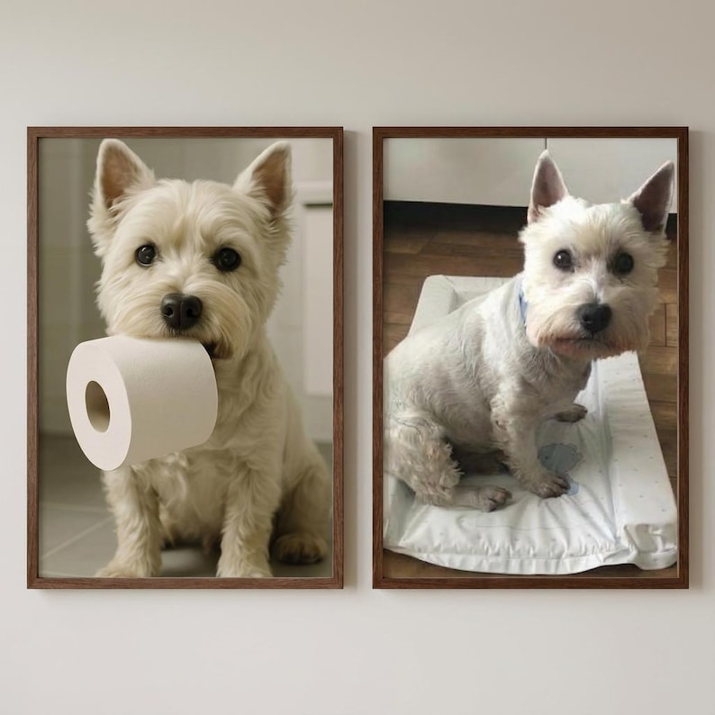 May include: Two framed prints featuring West Highland White Terriers. One shows a dog holding a roll of toilet paper, the other shows a dog sitting on a white pet bed. Both prints have brown frames and are set against a white wall.