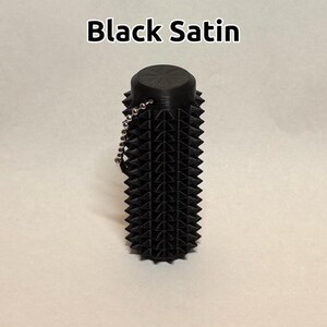 Rodillo antiestrés sensorial con púas - Estimulación para el alivio del dolor y la relajación - ¡Tamaño de la palma de la mano! Black Satin