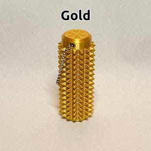 Rodillo antiestrés sensorial con púas - Estimulación para el alivio del dolor y la relajación - ¡Tamaño de la palma de la mano! Gold