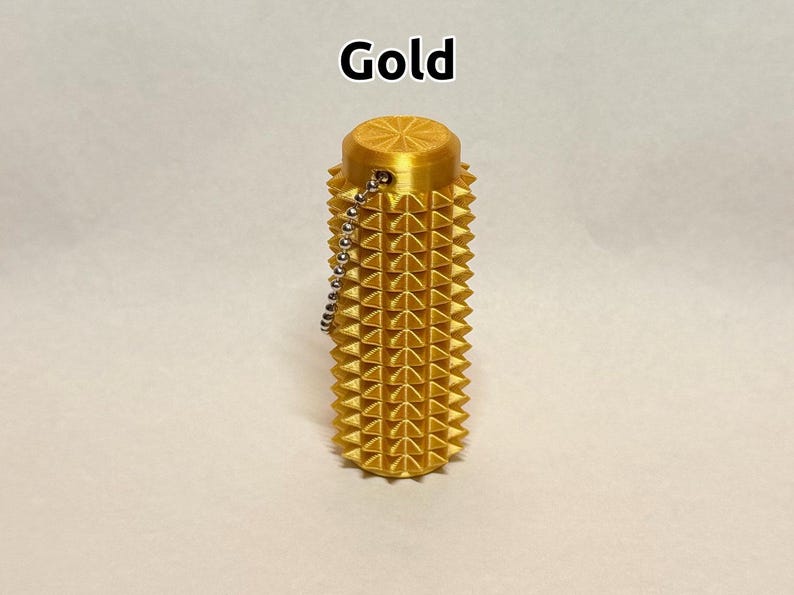 Rodillo antiestrés sensorial con púas - Estimulación para el alivio del dolor y la relajación - ¡Tamaño de la palma de la mano! Gold
