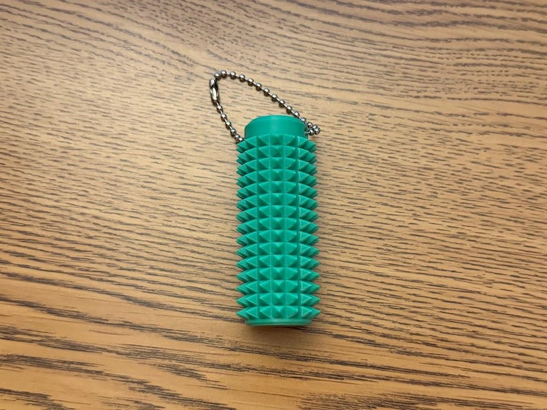 Rodillo antiestrés sensorial con púas - Estimulación para el alivio del dolor y la relajación - ¡Tamaño de la palma de la mano! Green