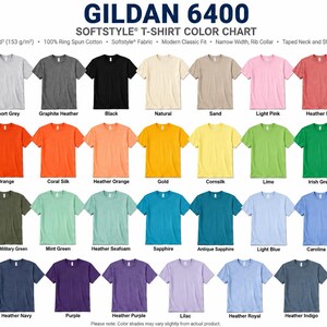 May include: A Gildan 6400 Softstyle t-shirt color chart displaying 40 short-sleeve shirts in various colors arranged in four rows. The text includes the product name, fabric specifications, and individual color names listed below each shirt.