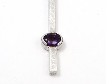 Silver square tube pendant with faceted amethyst