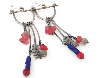 Silver earrings with a dangling cluster of gemstone beads.  Lapis lazuli, labradorite, pink jade, agate