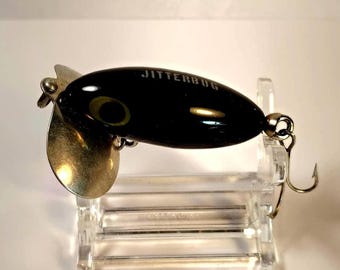 Vintage Fred Arbogast Jitterbug Fiskebete – Svart Topwater Bass Plug – Plastkropp från 1970–1980-talet – Samlarbete från Akron, Ohio