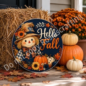Fall front door sign with navy wood-look background, cream Hello text, orange Fall text, and scarecrow.