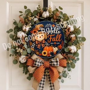 Round fall porch decor sign with scarecrow wearing a straw hat beside pumpkins and autumn flowers.