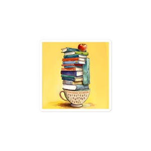 May include: A whimsical illustration of a stack of books balanced on a teacup. The books are various colors, topped with a red apple. The teacup has the text "CONTAINS VITAMIN" and the alphabet around the rim. The background is yellow.