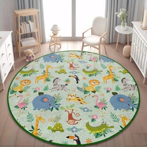 May include: A round area rug featuring a light green background with a repeating pattern of cartoon jungle animals including elephants, giraffes, lions, zebras, monkeys, crocodiles, toucans, and flamingos, finished with a dark green border.
