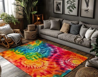 May include: A vibrant tie-dye area rug with a swirling pattern in shades of red, orange, yellow, green, and blue. The rug is rectangular and placed on a dark wood floor, adding a pop of color to the room.