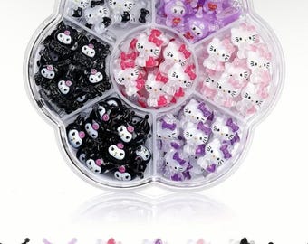 May include: A clear, flower-shaped container filled with various small, colorful figurines. The figurines include Hello Kitty and other cartoon characters in black, white, pink, purple, and clear colors. The container is on a white background.