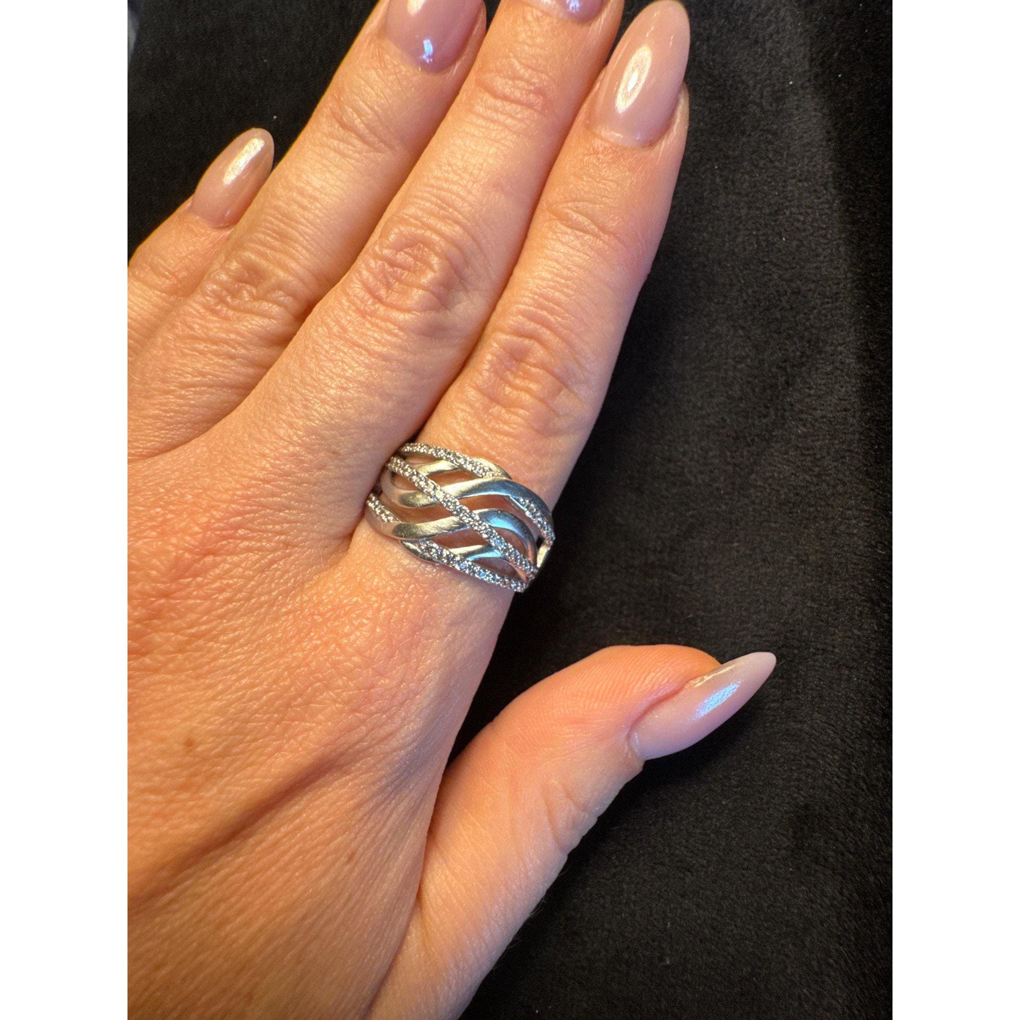 UK size W stunning sterling silver ring encrusted with cubic zirconia stones.