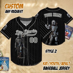 May include: Black baseball jersey with white pinstripes, featuring a Mandalorian graphic and the name "Din Djarin" with the number "00". The jersey includes the text "CUSTOM ANY REQUEST" and "KID/YOUTH/ADULT BASEBALL JERSEY".
