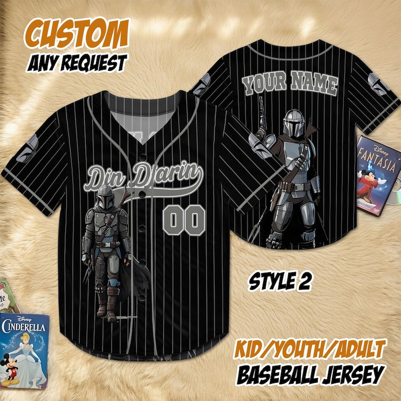May include: Black baseball jersey with white pinstripes, featuring a Mandalorian graphic and the name "Din Djarin" with the number "00". The jersey includes the text "CUSTOM ANY REQUEST" and "KID/YOUTH/ADULT BASEBALL JERSEY".