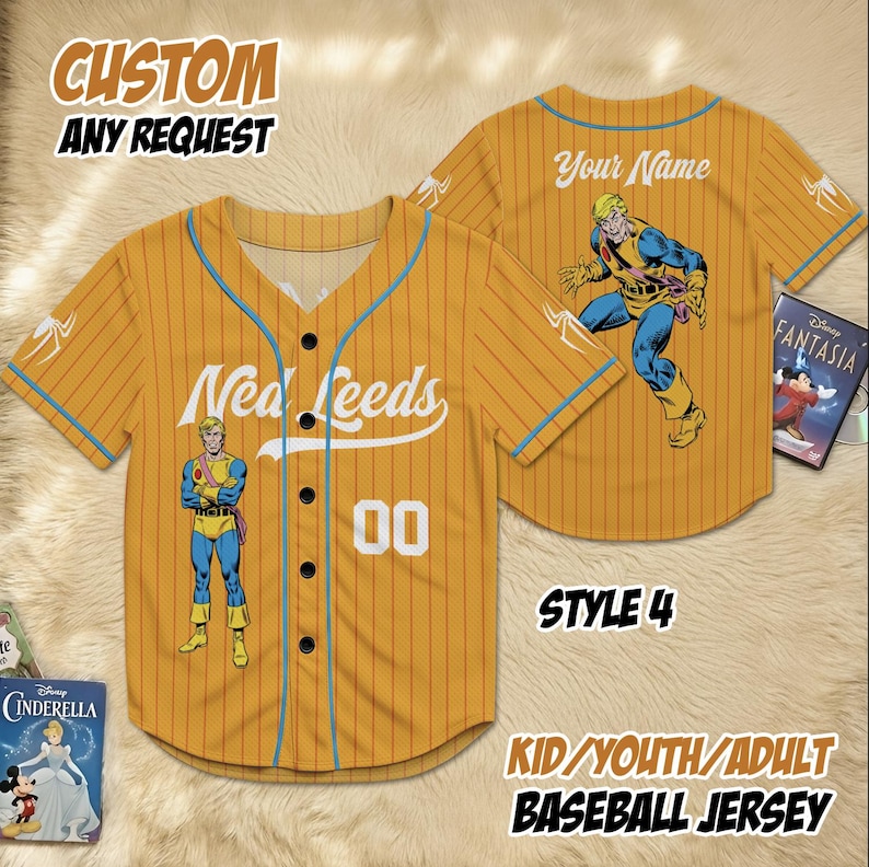 May include: Mustard yellow baseball jersey with blue accents and a comic book character graphic. The jersey features the name "Neal Leeds" and the number "00". Text on the jersey reads "CUSTOM ANY REQUEST" and "KID/YOUTH/ADULT BASEBALL JERSEY".
