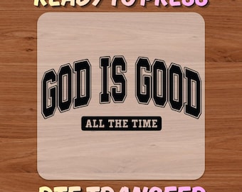May include: A DTF transfer with the text "GOD IS GOOD ALL THE TIME" in black, outlined in white, on a light wood-grain background. The words "READY TO PRESS" and "DTF TRANSFER" are in a gradient font.