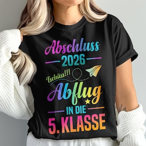 May include: A white ceramic mug with a black handle and the text "But First, Coffee" in a black, bold font. The mug is on a white surface.