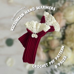 May include: A pair of Victorian hand warmers in a deep red color with cream-colored lace trim. The crochet pattern is visible, and the image includes text that reads "Victorian Hand Warmers," "Crochet PDF Pattern," and "8 Pages."