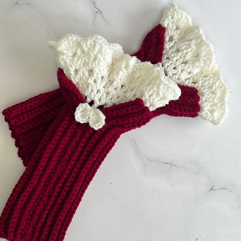Detailed view of crochet arm warmers featuring a classic ribbed cuff from this gloves pattern.