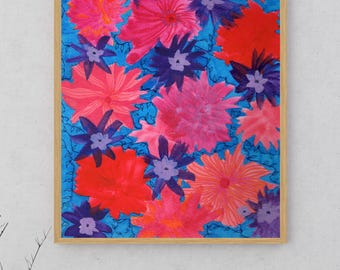 May include: A rectangular wall art print in a light wood frame featuring a vibrant floral pattern. The design displays numerous stylized flowers in shades of bright red, hot pink, and deep purple, set against a solid, vivid blue background.