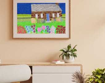 May include: A framed art print featuring a stone cottage with a gray roof and a blue door. The scene includes a vibrant green lawn, a dark blue sky, and a foreground filled with colorful red, pink, purple, and blue flowers in a garden setting.