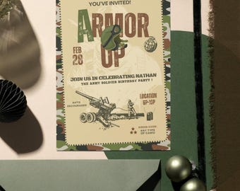 May include: Tan invitation with a camouflage border. The text reads "Armor Up" with the date Feb 28. The invitation is for Nathan's Army Soldier Birthday Party. Includes illustrations of military equipment and a grenade.