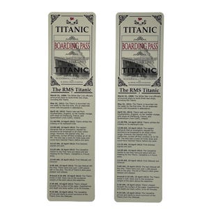 May include: Two rectangular bookmarks with a cream background and black text. The bookmarks feature the word "TITANIC" at the top, followed by "BOARDING PASS" and a depiction of the ship. The text details the RMS Titanic's history.