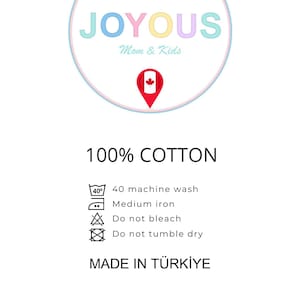 May include: White label with the text "JOYOUS Mom & Kids" in a circular design with pastel colors. Below, it reads "100% COTTON" and includes washing instructions. The label states "MADE IN T&Uuml;RKİYE".