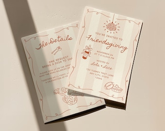 May include: Two cream-colored invitations with a Friendsgiving theme. The text includes "You're Invited to Friendsgiving" and "Bring a dish to share." Decorative elements include a disco ball, football, and pie. The invitations are hosted by Lola & Lace.