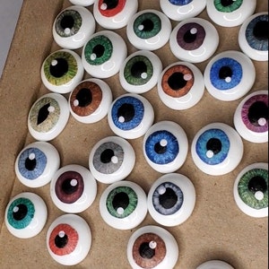 Realistic Glass Eyeballs with hand drawn Irises for Halloween or Apothecary Decoration.