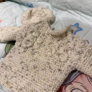 Hand knitted babies jumper and matching hat