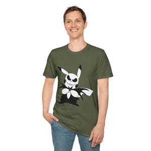 May include: Olive green t-shirt with a black and white graphic of a Pikachu character designed as Jack Skellington from The Nightmare Before Christmas. The graphic includes a bat-like cape and bow tie. The shirt is made of a soft material.