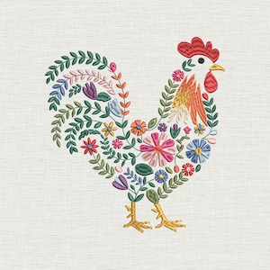 May include: An embroidered rooster design made from colourful flowers and leaves. The rooster has a red comb and wattle, with a body filled with pink, blue, orange, and yellow floral patterns. The background is a light beige fabric.