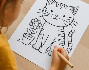 May include: A black and white line drawing of a cartoon cat with a flower in a pot. The cat has stripes and whiskers. A person is holding a pencil and coloring the drawing on white paper.