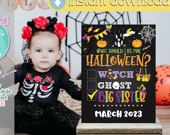 May include: A printable Halloween sign with a chalkboard background. The sign says "What should I be for Halloween?" with checkboxes for "Witch", "Ghost", and "Big Sister". The "Big Sister" box is checked. The sign also includes the date "March 2023".