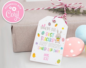 Peut inclure: Une étiquette cadeau blanche avec un design de lapin de Pâques et d'œufs colorés. Le texte dit "You're the best teacher any bunny could ask for!" avec le nom "Lexi" en bas.