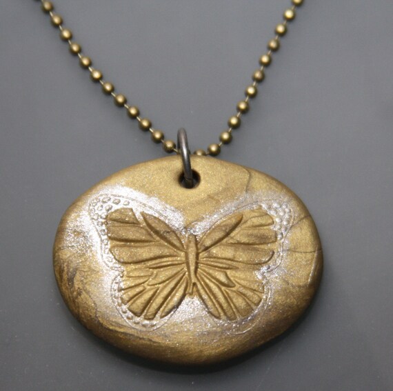 Items similar to Gold Clay Butterfly Necklace; Clay Pendant Necklace; Butterfly Necklace