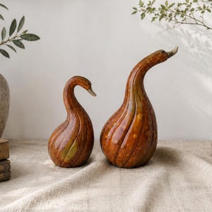 Esculturas de pato y ganso de cerámica vintage de estudio, par de animales de cerámica esmaltada en color ámbar