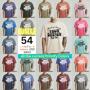 以下が含まれることがあります： 様々な色のTシャツのコレクションで、それぞれに太字の「YOUR DESIGN here」の文字が入っています。画像には「BUNDLE」、「54色」、および「all the current Printify Colors」という言葉も含まれています。