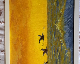 Pelicanos ao pôr do sol