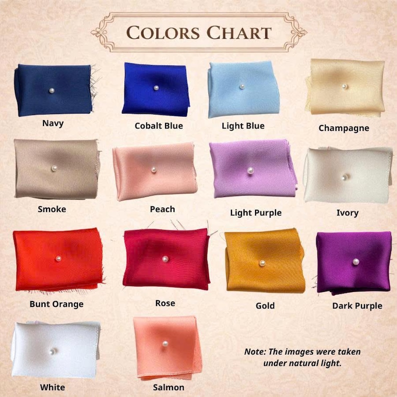 May include: A color chart displaying fourteen rectangular fabric swatches, each featuring a single centered white pearl. The colors include navy, cobalt blue, light blue, champagne, smoke, peach, light purple, ivory, burnt orange, rose, gold, dark purple, white, and salmon.