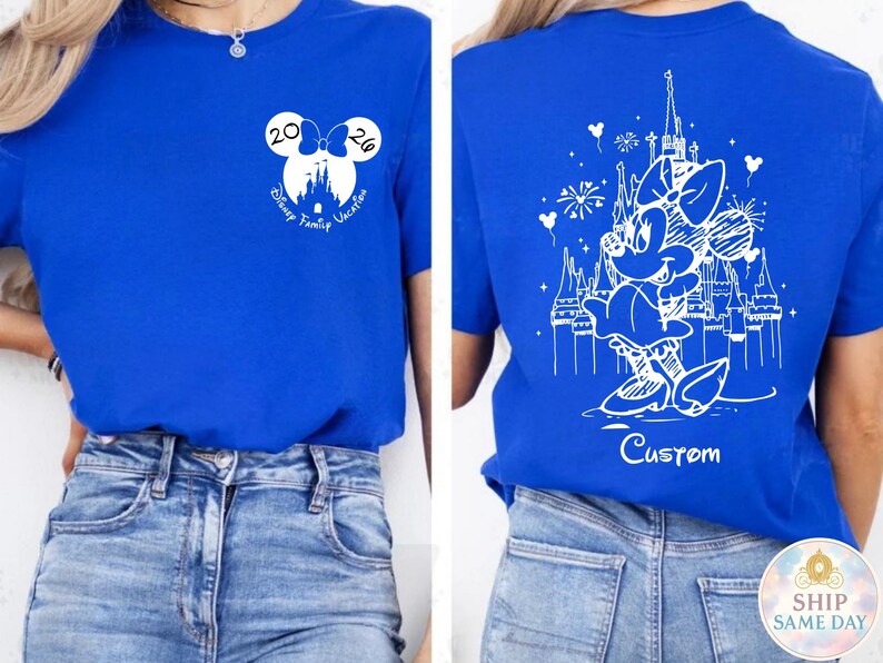 May include: Royal blue t-shirt featuring a white graphic of a Disney castle and Minnie Mouse. The front design includes the text "2026 Disney Family Vacation". The back design shows Minnie Mouse in front of the castle with the word "Custom".