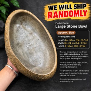 May include: A large stone bowl with a rough, textured exterior and a smooth, polished interior basin. The bowl features natural variations in color and shape, with dimensions ranging from 9.4 to 11.8 inches in length, 5.9 to 7.9 inches in width, and 2.0 to 3.9 inches in height.