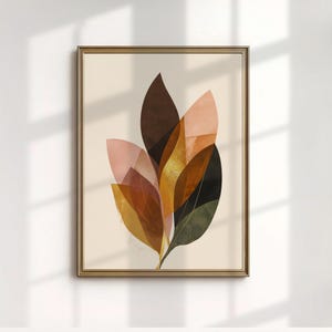 Könnte beinhalten: Abstrakter Kunstdruck mit sich überlappenden Blattformen in Braun-, Rosa-, Gold- und Grüntönen. Das Kunstwerk ist in einem goldfarbenen Rahmen gerahmt und vor einem cremefarbenen Hintergrund platziert. Die Blätter haben ein geometrisches, geschichtetes Design.