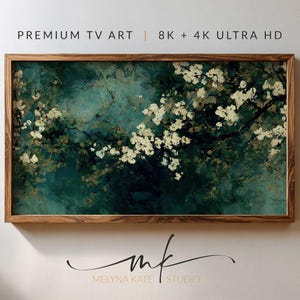 Op de afbeelding: Een ingelijste digitale kunstprint met een abstracte achtergrond in teal en groen en witte bloesemtakken. De houten lijst omringt het kunstwerk. Tekst bovenaan luidt "PREMIUM TV ART | 8K + 4K ULTRA HD". De handtekening van de kunstenaar staat onderaan.