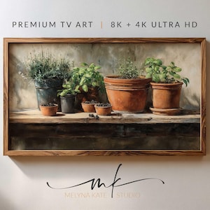 May include: A framed digital art print featuring a still life of potted herbs. The artwork showcases various terracotta and metal pots filled with green plants, arranged on a wooden shelf. The frame is a warm brown color, and the text "PREMIUM TV ART | 8K + 4K ULTRA HD" is visible.